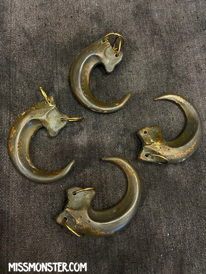 COLD CAST IRON CLAW PENDANT