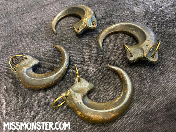 COLD CAST IRON CLAW PENDANT