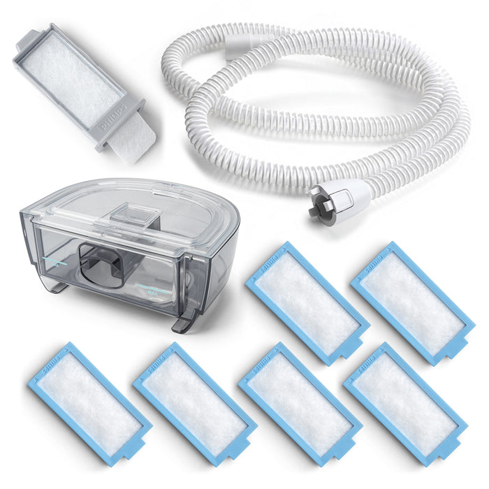 CPAP machine components including humidifier chamber, tubing, and filters on a white background